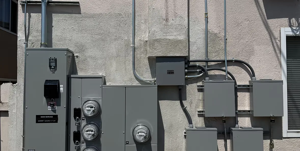 Exterior multi-meter service installed by MJ Electrical Services